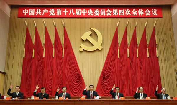 Top leaders including Party chief Xi Jinping attend the Fourth Plenary Session of the 18th Central Committee of the Communist Party of China in Beijing.LAN HONGGUANG / XINHUA  