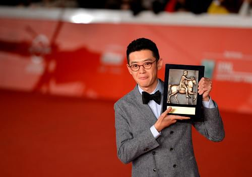 Chinese director Xu Ang's legal drama, 12 Citizens, won the cinema today people's choice award over the weekend at the conclusion of the Rome Film Festival. [Photo/Xinhua]