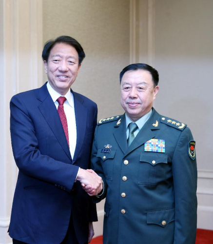 Vice Chairman of China's Central Military Commission Fan Changlong (R) meets with Singaporean Deputy Prime Minister and Minister for National Security and Home Affairs Teo Chee Hean in Beijing, capital of China, Oct 28, 2014. (Xinhua/Yao Dawei)