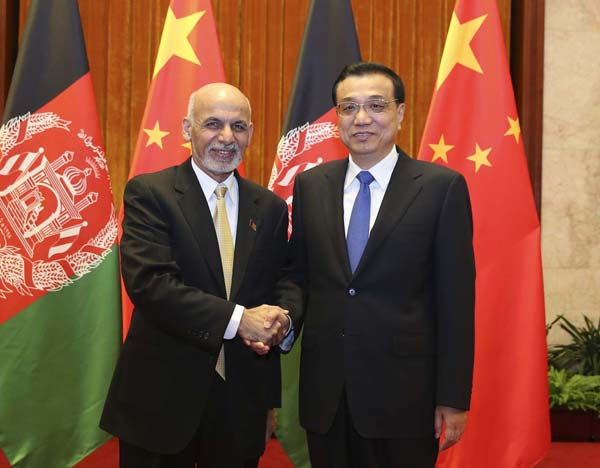 Chinese Premier Li Keqiang meets with visiting Afghan president Ashraf Ghani Ahmadzai at the Great Hall of the People in Beijing, Oct 29, 2014.[Photo/Xinhua]  