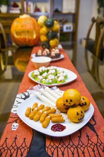 A spread of Halloween-themed food made by expat school teacher Pamela McManus. Photo: Li Hao/GT