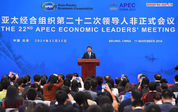 Chinese President Xi Jinping briefs the media on the status and achievements of the 22nd Asia-Pacific Economic Cooperation (APEC) Economic Leaders' Meeting after the event concluded at the Yanqi Lake International Convention Center in the northern suburb of Beijing, capital of China, Nov. 11, 2014. (Xinhua/Li Xueren)