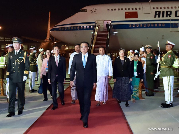 Chinese Premier Li Keqiang (C, front) arrives in Nay Pyi Taw, Myanmar, Nov 12, 2014, for a series of leaders' meetings on East Asian cooperation and an official visit to Myanmar. (Xinhua/Li Tao) 