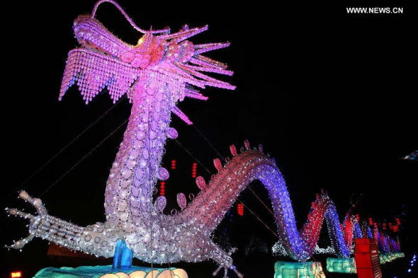 A dragon-shaped lantern is seen at the illumination ceremony for the Chinese Festival of Light in Longleat of Wiltshire, southwest England, on Nov 12, 2014. More than 100 workers from Zigong City of southwest China's Sichuan province have made 7,000 lanterns, which will be displayed at the Chinese Festival of Light lasting from Nov 14 to next January. (Xinhua/Han Yan) 
