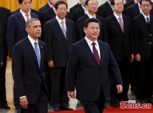 Chinese President Xi Jinping (R) holds a red-carpet ceremony to welcome his US counterpart Barack Obama at the Great Hall of the People in Beijing on Wednesday, Nov 12, 2014. (Photo: China News Service/Du Yang)