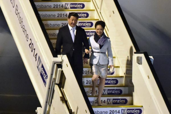 President Xi Jinping and his wife Peng Liyuan arrive in Brisbane on Friday ahead of the G20 summit in the Australian city this weekend. (Photo: China Daily/Agencies)