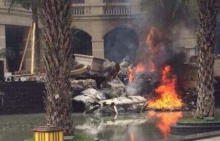 Photo posted on Sina Weibo shows the scene of an aircraft crash in Pixian County of Chengdu City, capital of Southwest China's Sichuan province, Nov 15, 2014. Pilots had bailed out before the aircraft fell to the ground near a village. 