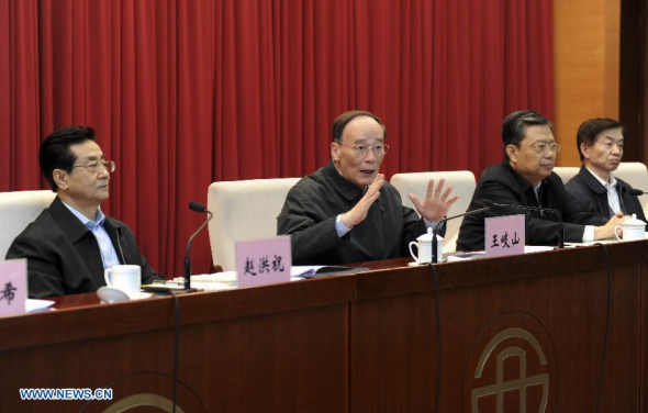 Wang Qishan (2nd L), a member of the Standing Committee of the Political Bureau of the Communist Party of China (CPC) Central Committee and secretary of the CPC Central Commission for Discipline Inspection, addresses a conference on the work of central-level Party inspection in Beijing, capital of China, Nov. 18, 2014. (Xinhua/Zhang Duo)