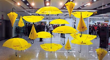 A 2008 photograph of umbrellas provided at Century Avenue Station. Many Metro stations now have few left as most are not returned.  Dong Jun