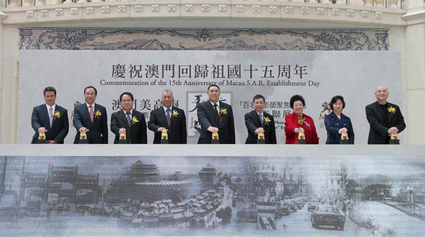 Ho Hau-wah (fourth from left), vice-chairman of the National Committee of the Chinese People's Political Consultative Conference, Chui Sai-on (center), chief executive of the Macao Special Administrative Region, Chan Laiwa (third from right), founder of the China Red Sandalwood Museum and Zhu Ling (second from left), publisher and editor-in-chief of China Daily, attend the launch ceremony of a photo album - One Hundred Photographers Focus on Macao - to celebrate the 15th anniversary of the return of Macao to China on Wednesday in Macao. The day was also the opening ceremony for the Red Sandalwood Art Exhibition of Old Beijing City Gates. Geng Feifei / China Daily