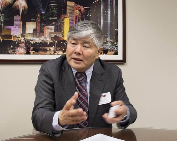 Diao Chunhe, chairman of China International Contractors Association, talks about plans for further cooperation between Texas and China in Houston on Wednesday.MAY ZHOU / CHINA DAILY 