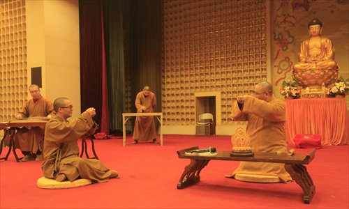 Monks from the Jade Buddha Temple perform one of their Buddhist dramas. Photo: Wang Zhefeng/GT