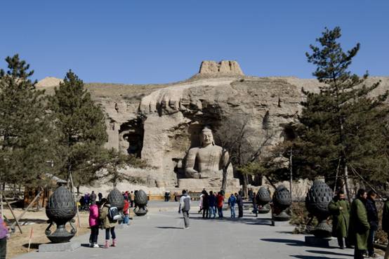 Buddhist sculpture at the Yungang Grottoes [Photo / dtnews.cn]