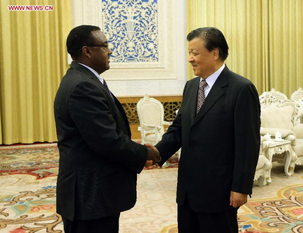 Liu Yunshan (R), a member of the Standing Committee of the Political Bureau of the Communist Party of China (CPC) Central Committee and secretary of the Secretariat of the CPC Central Committee, meets with Demeke Mekonnen, vice prime minister of Ethiopia and vice chairman of the Ethiopian People's Revolutionary Democratic Front, in Beijing, capital of China, Nov. 24, 2014. (Xinhua/Liu Weibing) 