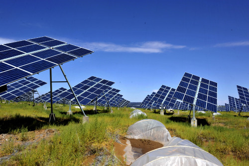 GREEN POWER: Solar panels are harnessed in an effort to generate clean energy in Gulang County of northwest China's Gansu province (LIAN ZHENXIANG)