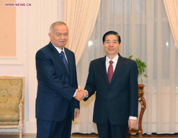 Uzbek President Islam Karimov (L) meets with Chinese State Councilor Guo Shengkun in Tashkent, capital of Uzbekistan, on Dec 1, 2014. (Xinhua/Sadat)