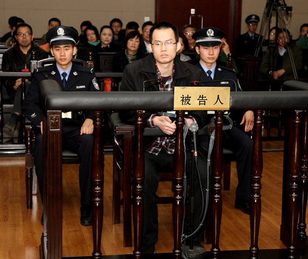 Lin Senhao, former student at Fudan University, stands on trial for a second time at Shanghai High Peoples Court on Monday. 