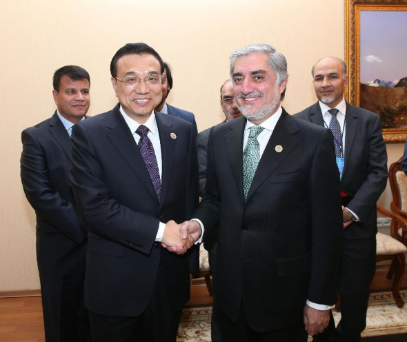 Chinese Premier Li Keqiang (L front) meets with Afghanistan Chief Executive Officer Abdullah Abdullah in Astana, Kazakhstan, Dec 15, 2014. (Xinhua/Pang Xinglei)