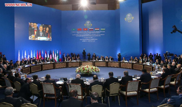 Photo taken on Dec 15, 2014 shows the scence of the 13th prime ministers' meeting of the Shanghai Cooperation Organization (SCO) in Astana, Kazakhstan. Chinese Premier Li Keqiang attended the meeting. (Xinhua/Pang Xinglei)