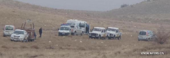Emergency service and police carry out rescue work in Nevsehir province in central Turkey, Dec. 17, 2014. A Chinese tourist was killed and many others injured when a hot air balloon hard landed in central Turkey on Wednesday, according to the Chinese embassy in Turkey and private Dogan news agency. (Xinhua/Cihan)