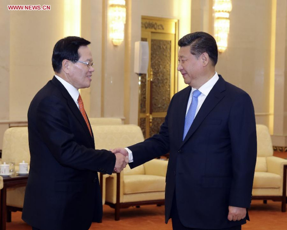 Chinese President Xi Jinping (R) meets with Chung Ui-hwa, speaker of the National Assembly for the Republic of Korea(ROK), in Beijing, China, Dec 18, 2014. (Xinhua/Ding Lin)