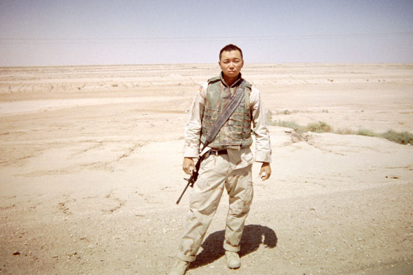 William Chan is one of the Chinese-American soldiers interviewed by Victoria Moy in her latest book Fighting For the Dream: Voices of Chinese American Veterans from World War II to Afghanistan. Chan is pictured here during Operation Iraqi Freedom in 2003. Photo provided to China Daily