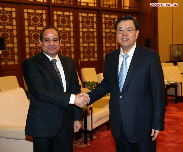 Zhang Dejiang (R), chairman of the Standing Committee of the National People's Congress (NPC), meets with Egyptian President Abdel Fattah al-Sisi in Beijing, capital of China, Dec. 24, 2014.(Xinhua/Liu Weibing)