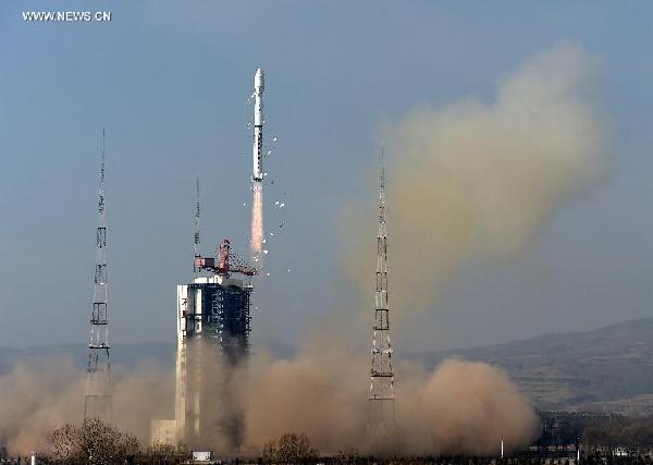 A Long March-4B rocket carrying the Yaogan-26 remote sensing satellite blasts off from the launch pad at the Taiyuan Satellite Launch Center in Taiyuan, capital of north China's Shanxi Province, Dec 27, 2014. Yaogan satellites are mainly used for scientific experiments, natural resource surveys, crop yield estimates and disaster relief. (Xinhua/Yan Yan)