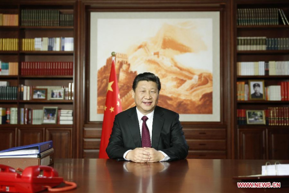 Chinese President Xi Jinping delivers his New Year speech via state broadcasters, in Beijing, capital of China, Dec 31, 2014. (Xinhua/Ju Peng)