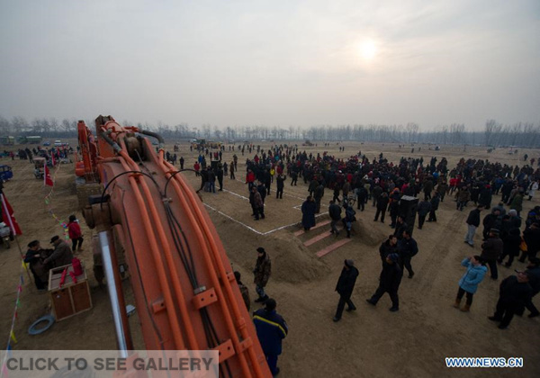 The ground breaking ceremony of Beijing's new airport is held in the Daxing District of Beijing, capital of China, Dec 26, 2014. The airport is designed to handle 72 million passengers, 2 million tonnes of cargo and mail, and 620,000 flights in 2025. (Xinhua/Luo Xiaoguang)