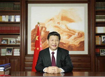 Chinese President Xi Jinping delivers his New Year speech via state broadcasters in Beijing, Dec. 31, 2014. [Photo/Xinhua]