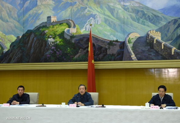 Chinese Vice Premier Ma Kai (C), State Councilor Guo Shengkun (R) and State Councilor Wang Yong attend a national teleconference on production safety in Beijing, capital of China, Jan. 6, 2015. (Xinhua/Rao Aimin) 