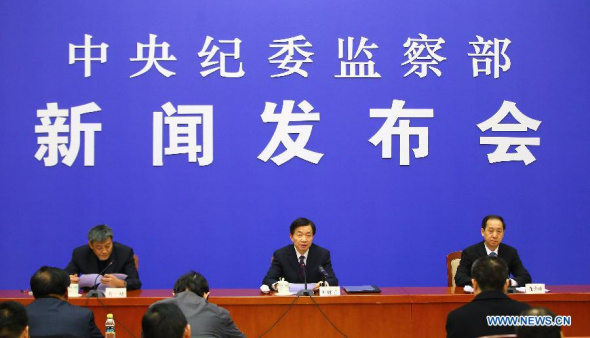 Huang Shuxian (C), deputy secretary of the Communist Party of China's (CPC) Central Commission for Discipline Inspection (CCDI), speaks during a press conference summing up China's sweeping counter-corruption campaign in Beijing, capital of China, Jan. 7, 2015. (Xinhua/Yin Gang)