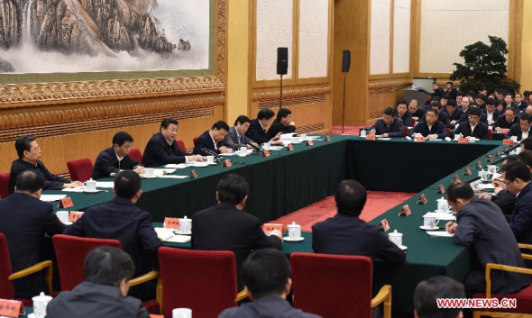 Chinese President Xi Jinping (back, 3rd L), who is also general secretary of the Communist Party of China (CPC) Central Committee, delivers a keynote speech during the first seminar for county-level Party chiefs at the Party School of the CPC Central Committee in Beijing, China, Jan 12, 2015. (Xinhua/Rao Aimin)