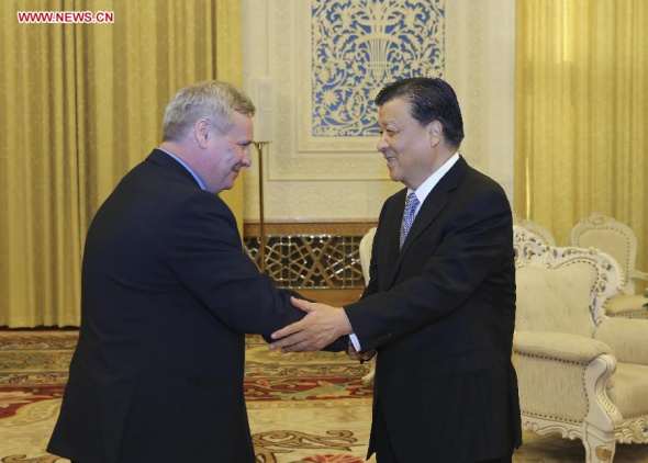 Liu Yunshan (R), a member of the Standing Committee of the Political Bureau of the Communist Party of China (CPC) Central Committee, meets with Chairman of the Finnish Social Democratic Party (SDP) and Finnish Finance Minister Antti Rinne in Beijing, China, Jan 12, 2015. (Xinhua/Ding Lin) 