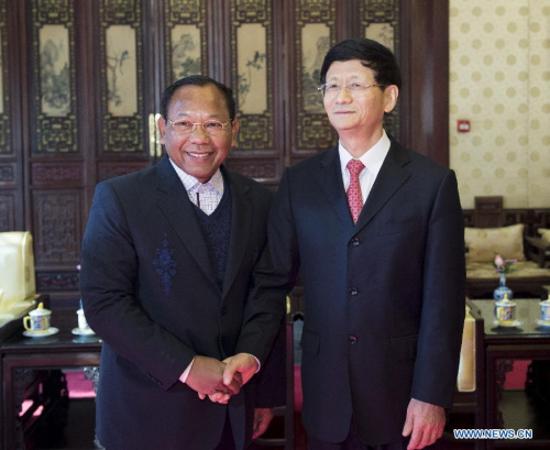 Meng Jianzhu(R), head of the Commission for Political and Legal Affairs of the Communist Party of China (CPC) Central Committee, meets with Saud Usman Nasution, Indonesia's National Counterterrorism Agency chief, in Beijing, capital of China, Jan. 13, 2015. (Xinhua/Wang Ye)