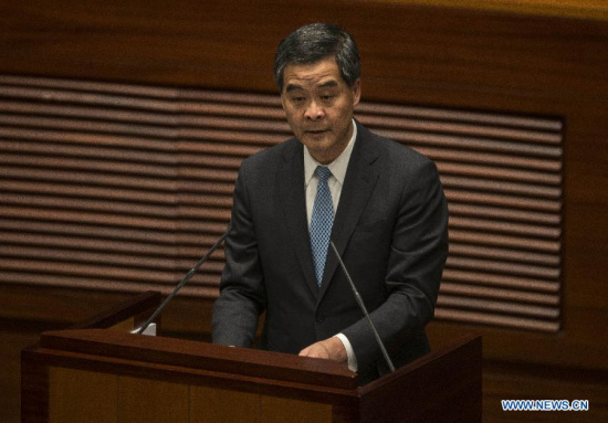 Hong Kong Chief Executive Leung Chun-ying delivers his policy address for the year of 2015 in Hong Kong, south China, Jan. 14, 2015. (Xinhua/Lui Siu Wai)