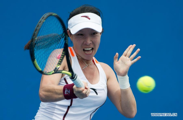 Zheng Jie of China returns the ball during the women's singles first round match against Kai-Chen Chang of Chinese Taipei at the Australian Open tournament in Melbourne, Australia, Jan. 20, 2015. Zheng Jie lost 0-2. (Xinhua/Bai Xue)