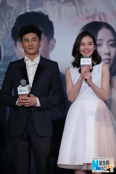 Nicky Wu and actress Liu Shishi promote the new TV series Bu Bu Jing Qing, a sequel to the hit drama Startling by Each Step in Beijing, April 20, 2014.[Photo/Xinhua] 