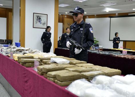 Nearly 29,000 kilograms of drugs were seized by police in Guangdong during an anti-drug operation from August 2013 to December. Liang Guanhua / for China Daily  