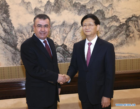 Meng Jianzhu (R), head of the Commission for Political and Legal Affairs of the Communist Party of China (CPC) Central Committee, meets with Mehmet Celalettin Lekesiz, chief of Turkish National Police, in Beijing, capital of China, Jan. 27, 2015. (Xinhua/Pang Xinglei) 