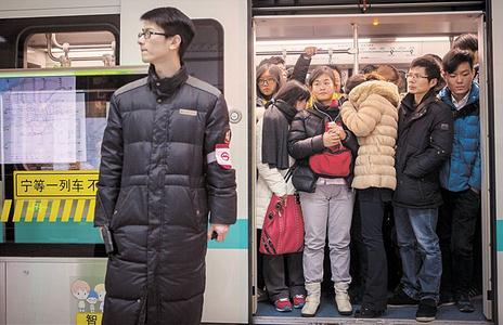 A Metro staff member outside a crowded train on Line 16.  Sun Zhan