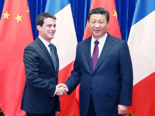 Chinese president Xi Jinping(R) meets with Frech Prime Minister Manuel Valls in Beijing, capital of China, Jan 30, 2015[Photo/Xinhua]
