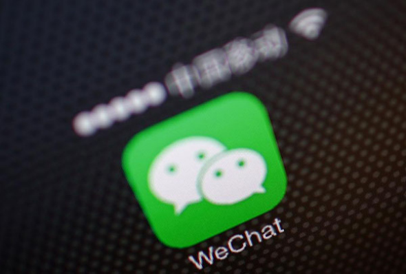 A WeChat app icon is pictured in Beijing, in this December 5, 2013 file picture illustration. [Photo: China Daily/Agencies] 