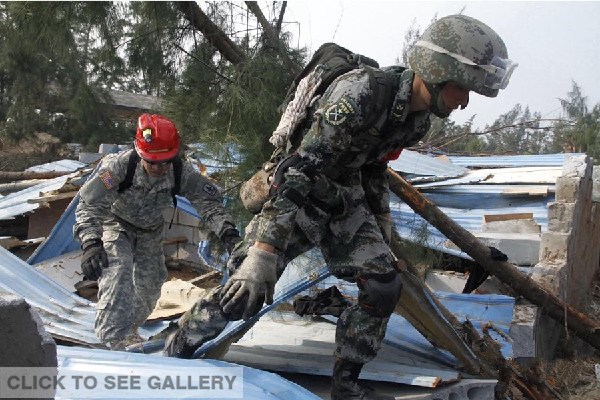 The US-China Joint Humanitarian Assistance and Disaster Relief Exercise entered the actual troop drilling phase in Haikou city, south China's Hainan province, on January 18, 2015.