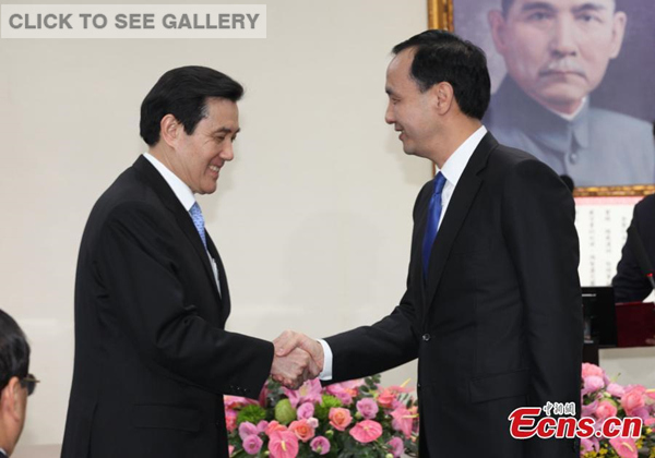 Former KMT leader Ma Ying-jeou(L) shakes hand with Eric Chu(R) on Jan 19, 2015. [Photo: China News service/Lu Mei]]