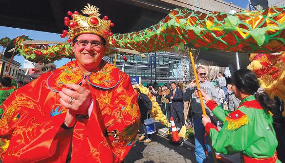 A man wears Chinese traditional clothing to celebrate the 2014 Spring Festival in Los Angeles.
