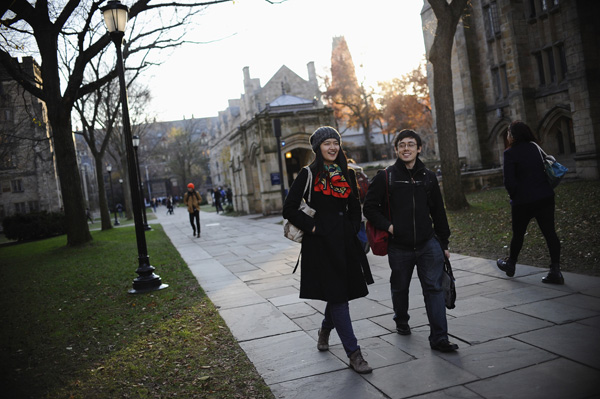 Yale University sophomore Guo Yupei (left) walks with friend Joseph Lachman on the school's campus. JESSICA HILL/ASSOCIATED PRESS