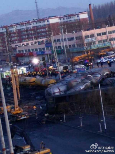 A freight train is derailed after colliding with a truck on Feb 9, 2015. [Photo/Liaoshen Evening News]