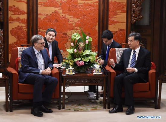 Chinese Vice Premier Wang Yang (R) meets with Bill Gates, founder and chairman of TerraPower, in Beijing, China, Feb. 10, 2015. (Xinhua/Xie Huanchi)
